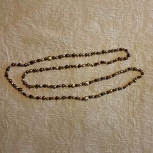 Stunning 54” strand of genuine freshwater pearls
